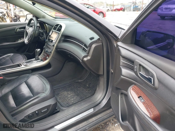 2013 Chevrolet Malibu LTZ with VIN 1G11H5SA5DF267940, listed as a IAAI auction lot 41854067 with 159,946 mi miles. Bid and sale history available at carsss.com. Image 5.