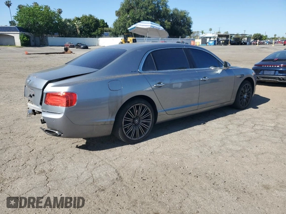 2014 Bentley Flying Spur с VIN SCBEC9ZA7EC090575, выставлен на аукционе Copart как лот 57110315 с пробегом 19 083 миль миль и Списание • Salvage title. История ставок и продаж доступна на DreamBid. Изображение 3.