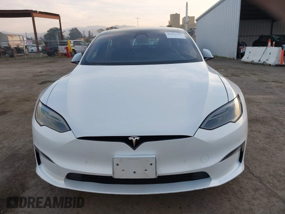 2022 Tesla Model S with VIN 5YJSA1E57NF483768, listed as a IAAI auction lot 41069339 with 35,342 mi miles and . Bid and sale history available at DreamBid. Image 12.
