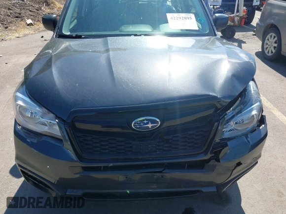 2018 Subaru Forester z VIN JF2SJABC1JH460419, wystawiony jako IAAI lot #42292895 z przebiegiem 141 486 mil mil oraz . Historia ofert i sprzedaży dostępna na DreamBid. Obrazek 12.