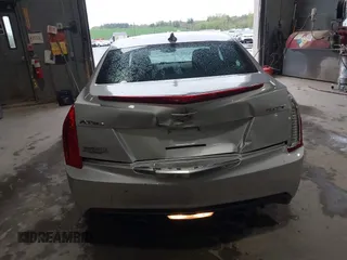 2016 Cadillac ATS Standard AWD z VIN 1G6AG5RX6G0149829, wystawiony jako IAAI lot #42165534 z przebiegiem 40 996 mil mil oraz . Historia ofert i sprzedaży dostępna na DreamBid. Obrazek 6.