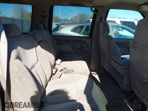1997 Chevrolet Suburban with VIN 3GNFK16R9VG184722, listed as a IAAI auction lot 41662635 with 176,652 mi miles. Bid and sale history available at carsss.com. Image 8.