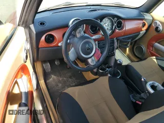 2006 MINI Convertible S with VIN WMWRH33576TF89127, listed as a Copart auction lot 49763365 with 150,446 mi miles and Salvage title. Bid and sale history available at DreamBid. Image 8.
