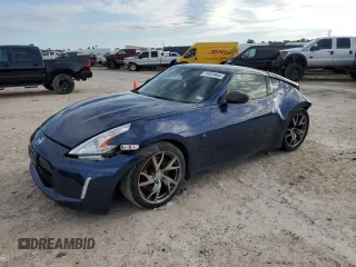 2013 Nissan 370Z with VIN JN1AZ4EH6DM880252, listed as a Copart auction lot 70528464 with 63,111 mi miles and Salvage Title. Bid and sale history available at carsss.com. Image 1.