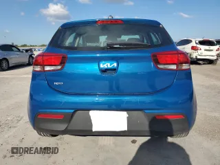 2023 Kia Rio S with VIN 3KPA25AD9PE548173, listed as a Copart auction lot 50232915 with 26,668 mi miles and Salvage Title. Bid and sale history available at DreamBid. Image 6.