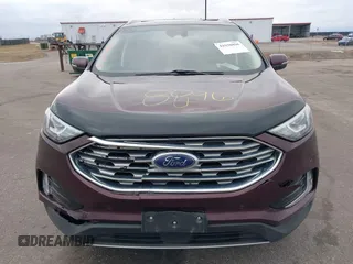 2020 Ford Edge Titanium z VIN 2FMPK4K91LBB56297, wystawiony jako IAAI lot #41938896 z przebiegiem 79 875 mil mil oraz . Historia ofert i sprzedaży dostępna na DreamBid. Obrazek 12.