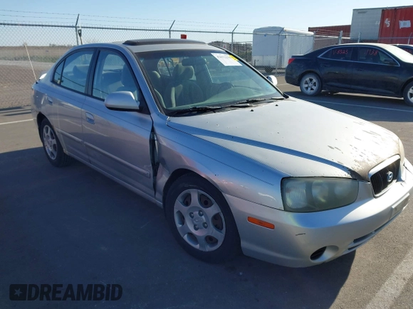 2003 Hyundai Elantra GLS z VIN KMHDN45D63U553542, wystawiony jako IAAI lot #42032294 z przebiegiem 164 210 mil mil oraz . Historia ofert i sprzedaży dostępna na DreamBid. Obrazek 1.