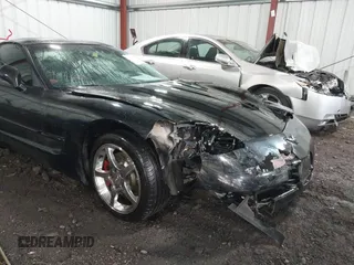 1999 Chevrolet Corvette with VIN 1G1YY22G0X5102521, listed as a IAAI auction lot 41664873 with 100,896 mi miles. Bid and sale history available at carsss.com. Image 6.