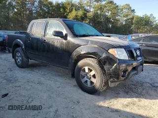 2010 Nissan Frontier LE with VIN 1N6AD0EV1AC407478, listed as a Copart auction lot 82302504 with 146,560 mi miles and Salvage title. Bid and sale history available at DreamBid. Image 4.