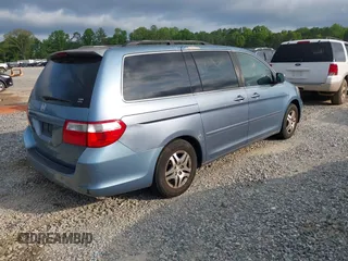 2007 Honda Odyssey EX with VIN 5FNRL38457B037239, listed as a IAAI auction lot 42034219 with 291,885 mi miles. Bid and sale history available at carsss.com. Image 4.