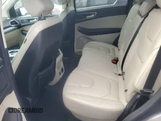 2021 Ford Edge Titanium z VIN 2FMPK3K92MBA53689, wystawiony jako IAAI lot #42501151 z przebiegiem 93 941 mil mil oraz . Historia ofert i sprzedaży dostępna na DreamBid. Obrazek 4.