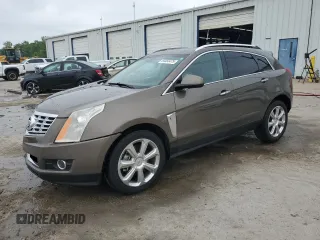 2015 Cadillac SRX Performance Collection z VIN 3GYFNCE31FS551985, wystawiony jako Copart lot #54483475 z przebiegiem 169 696 mil mil oraz Szkody całkowita. Historia ofert i sprzedaży dostępna na DreamBid. Obrazek 1.