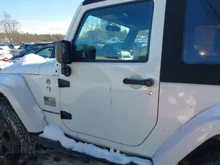 2012 Jeep Wrangler Arctic with VIN 1C4GJWBG9CL290847, listed as a IAAI auction lot 41281316 with 106,473 mi miles. Bid and sale history available at carsss.com. Image 14.