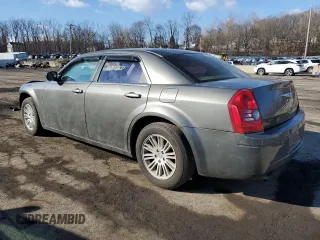 2009 Chrysler 300 LX with VIN 2C3KA43D79H554807, listed as a Copart auction lot 46872625 with 139,843 mi miles and Salvage Title. Bid and sale history available at carsss.com. Image 2.