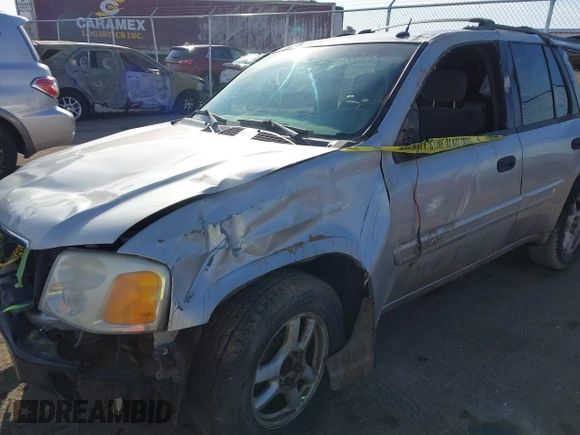2004 GMC Envoy SLT with VIN 1GKDT13S742133932, listed as a IAAI auction lot 41598339 with 168,651 mi miles and . Bid and sale history available at DreamBid. Image 6.
