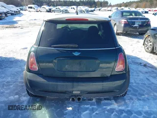 2003 MINI Hardtop S z VIN WMWRE33473TD72981, wystawiony jako IAAI lot #41599521 z przebiegiem 97 403 mil mil oraz . Historia ofert i sprzedaży dostępna na DreamBid. Obrazek 17.