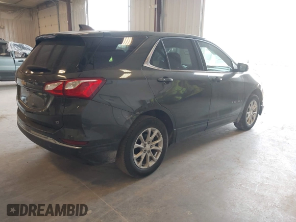 2018 Chevrolet Equinox LT z VIN 3GNAXJEV5JS569101, wystawiony jako IAAI lot #42055496 z przebiegiem 173 494 mil mil oraz . Historia ofert i sprzedaży dostępna na DreamBid. Obrazek 4.