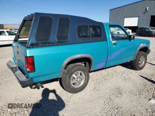 1996 Dodge Dakota z VIN 1B7GG26X9TW707044, wystawiony jako Copart lot #77101384 z przebiegiem 112 847 mil mil oraz Szkoda całkowita • Salvage title. Historia ofert i sprzedaży dostępna na DreamBid. Obrazek 3.