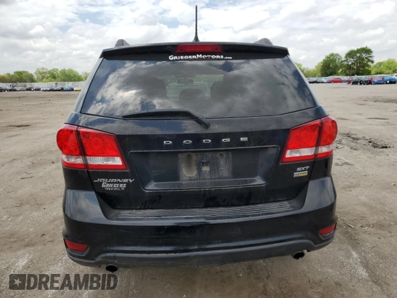 2014 Dodge Journey SXT z VIN 3C4PDCBG8ET115115, wystawiony jako Copart lot #56632555 z przebiegiem 139 785 mil mil oraz Szkoda całkowita • Salvage title. Historia ofert i sprzedaży dostępna na DreamBid. Obrazek 6.