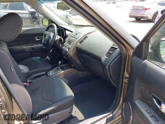 2012 Kia Soul + with VIN KNDJT2A66C7440908, listed as a IAAI auction lot 42049004 with 63,083 mi miles and . Bid and sale history available at DreamBid. Image 5.