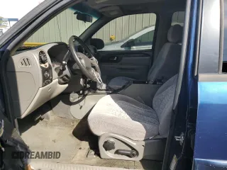 2004 GMC Envoy SLE with VIN 1GKDS13S842402250, listed as a Copart auction lot 54941005 with 163,380 mi miles and Salvage Title. Bid and sale history available at DreamBid. Image 7.