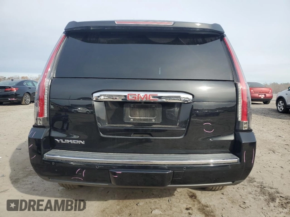 2015 GMC Yukon Denali with VIN 1GKS1CKJ1FR303049, listed as a Copart auction lot 82435514 with 100,693 mi miles and Salvage Title. Bid and sale history available at carsss.com. Image 6.