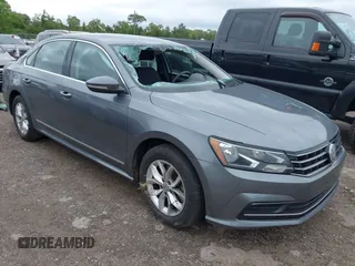 2017 Volkswagen Passat S z VIN 1VWAT7A38HC004849, wystawiony jako IAAI lot #41994444 z przebiegiem 117 953 mil mil oraz . Historia ofert i sprzedaży dostępna na DreamBid. Obrazek 1.