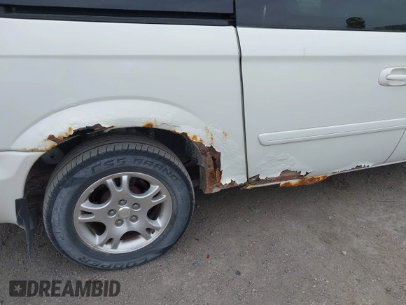 2004 Dodge Caravan SXT z VIN 2D4GP44L14R617041, wystawiony jako IAAI lot #42131204 z przebiegiem 176 105 mil mil oraz . Historia ofert i sprzedaży dostępna na DreamBid. Obrazek 15.