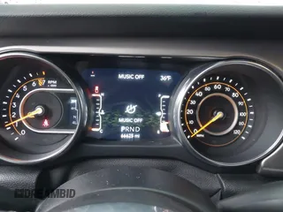 2020 Jeep Gladiator Sport S z VIN 1C6HJTAG0LL129461, wystawiony jako IAAI lot #41464713 z przebiegiem 66 625 mil mil oraz . Historia ofert i sprzedaży dostępna na DreamBid. Obrazek 7.