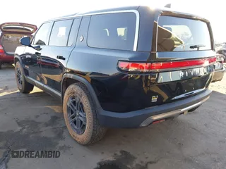 2024 Rivian R1S Adventure with VIN 7PDSGABAXRN034598, listed as a IAAI auction lot 41312180 with 23,615 mi miles. Bid and sale history available at carsss.com. Image 3.