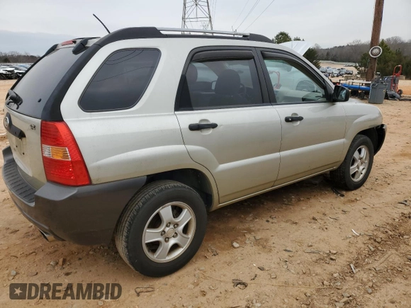 2006 Kia Sportage LX z VIN KNDJF724467145179, wystawiony jako Copart lot #41755105 z przebiegiem 250 252 mil mil oraz Szkoda całkowita • Salvage title. Historia ofert i sprzedaży dostępna na DreamBid. Obrazek 3.