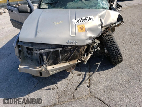 1994 Jeep Grand Cherokee Laredo z VIN 1J4GZ58S5RC328902, wystawiony jako Copart lot #70150474 z przebiegiem 195 604 mil mil oraz Szkoda całkowita • Salvage title. Historia ofert i sprzedaży dostępna na DreamBid. Obrazek 12.