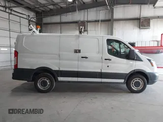 2015 Ford Transit Cargo with VIN 1FTNR1ZM2FKA55134, listed as a IAAI auction lot 42193601 with 96,231 mi miles and . Bid and sale history available at DreamBid. Image 13.