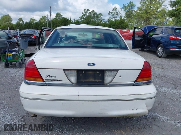 2001 Ford Crown Victoria LX z VIN 2FAFP74W81X102216, wystawiony jako IAAI lot #42388800 z przebiegiem 225 623 mil mil oraz . Historia ofert i sprzedaży dostępna na DreamBid. Obrazek 16.