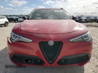 2019 Alfa Romeo Stelvio Ti z VIN ZASPAKBN8K7C69851, wystawiony jako Copart lot #49490875 z przebiegiem Nie podano mil oraz Szkody całkowita. Historia ofert i sprzedaży dostępna na DreamBid. Obrazek 5.