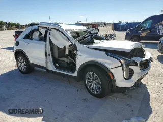 2020 Cadillac XT4 FWD Premium Luxury with VIN 1GYFZCR48LF128683, listed as a Copart auction lot 49591405 with 0 mi miles and Salvage Title. Bid and sale history available at carsss.com. Image 4.