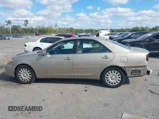 2003 Toyota Camry LE with VIN 4T1BE30K83U176834, listed as a IAAI auction lot 41307922 with 182,019 mi miles and . Bid and sale history available at DreamBid. Image 14.