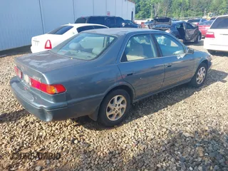 2000 Toyota Camry CE z VIN JT2BG22K5Y0476098, wystawiony jako IAAI lot #42200385 z przebiegiem Nie podano mil oraz . Historia ofert i sprzedaży dostępna na DreamBid. Obrazek 4.