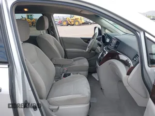 2015 Nissan Quest SV with VIN JN8AE2KP8F9125445, listed as a IAAI auction lot 42040196 with 125,218 mi miles. Bid and sale history available at carsss.com. Image 5.