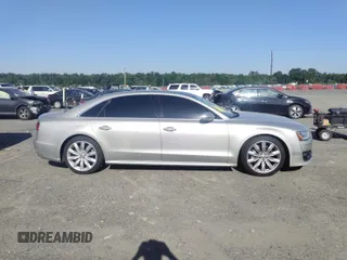 2017 Audi A8 with VIN WAU44AFD3HN014802, listed as a IAAI auction lot 42573537 with 121,096 mi miles and . Bid and sale history available at DreamBid. Image 13.