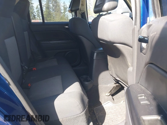 2009 Jeep Patriot Sport with VIN 1J4FT28B29D167558, listed as a IAAI auction lot 42035618 with 166,854 mi miles. Bid and sale history available at carsss.com. Image 8.