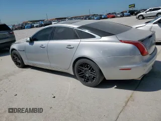 2012 Jaguar XJ with VIN SAJWA1CB0CLV23002, listed as a Copart auction lot 52804915 with 149,331 mi miles and Salvage title. Bid and sale history available at DreamBid. Image 2.