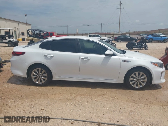 2018 Kia Optima LX z VIN 5XXGT4L31JG234618, wystawiony jako IAAI lot #42126375 z przebiegiem 111 540 mil mil oraz . Historia ofert i sprzedaży dostępna na DreamBid. Obrazek 13.