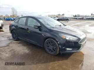 2016 Ford Focus SE with VIN 1FADP3F29GL380672, listed as a Copart auction lot 44062305 with 84,917 mi miles and Salvage title. Bid and sale history available at DreamBid. Image 4.
