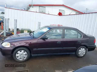 2000 Honda Civic LX with VIN 1HGEJ6676YL036362, listed as a IAAI auction lot 41912249 with 135,112 mi miles. Bid and sale history available at carsss.com. Image 14.