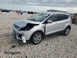 2015 Ford Escape Titanium с VIN 1FMCU0JXXFUA77744, выставлен на аукционе Copart как лот 55754795 с пробегом 140 035 миль миль и Списание • Salvage title. История ставок и продаж доступна на DreamBid. Изображение 1.