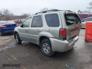2005 Mercury Mariner Luxury with VIN 4M2YU57175DJ05986, listed as a IAAI auction lot 41713180 with 243,682 mi miles. Bid and sale history available at carsss.com. Image 3.