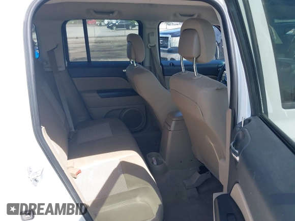 2014 Jeep Patriot Sport with VIN 1C4NJPBB3ED618570, listed as a IAAI auction lot 42126639 with 157,005 mi miles and . Bid and sale history available at DreamBid. Image 8.