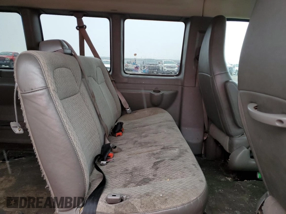 2017 Chevrolet Express Passenger LT z VIN 1GAZGPFF7H1225215, wystawiony jako Copart lot #47135935 z przebiegiem 161 084 mil mil oraz Szkoda całkowita • Salvage title. Historia ofert i sprzedaży dostępna na DreamBid. Obrazek 11.
