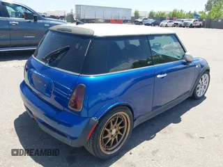2006 MINI Hardtop S with VIN WMWRE33576TL24276, listed as a IAAI auction lot 42278094 with 148,269 mi miles and . Bid and sale history available at DreamBid. Image 4.